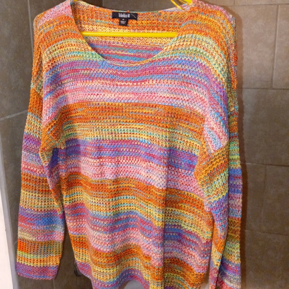 Multi colored light sweater